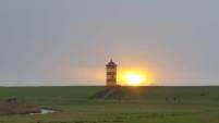 Leuchtturm im Sonnenuntergang